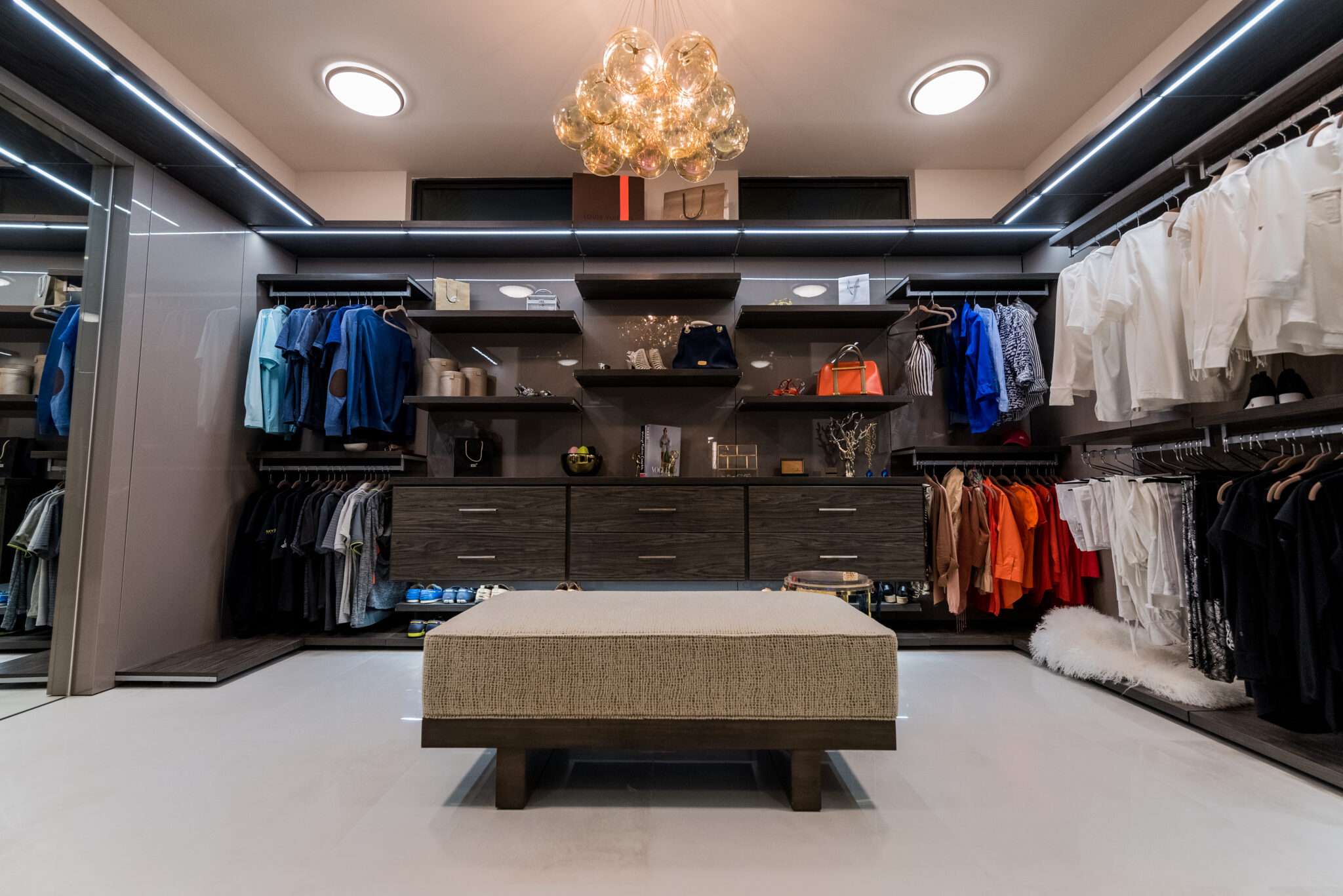 Luxury Custom Closet In Florida Featuring Elegant Drawers, Display Shelves, And Premium Lighting. Designed For High-End Organization And Modern Aesthetics By Jl Closets.