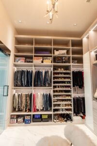 Luxury walk in closet and shoe storage system with integrated lighting system