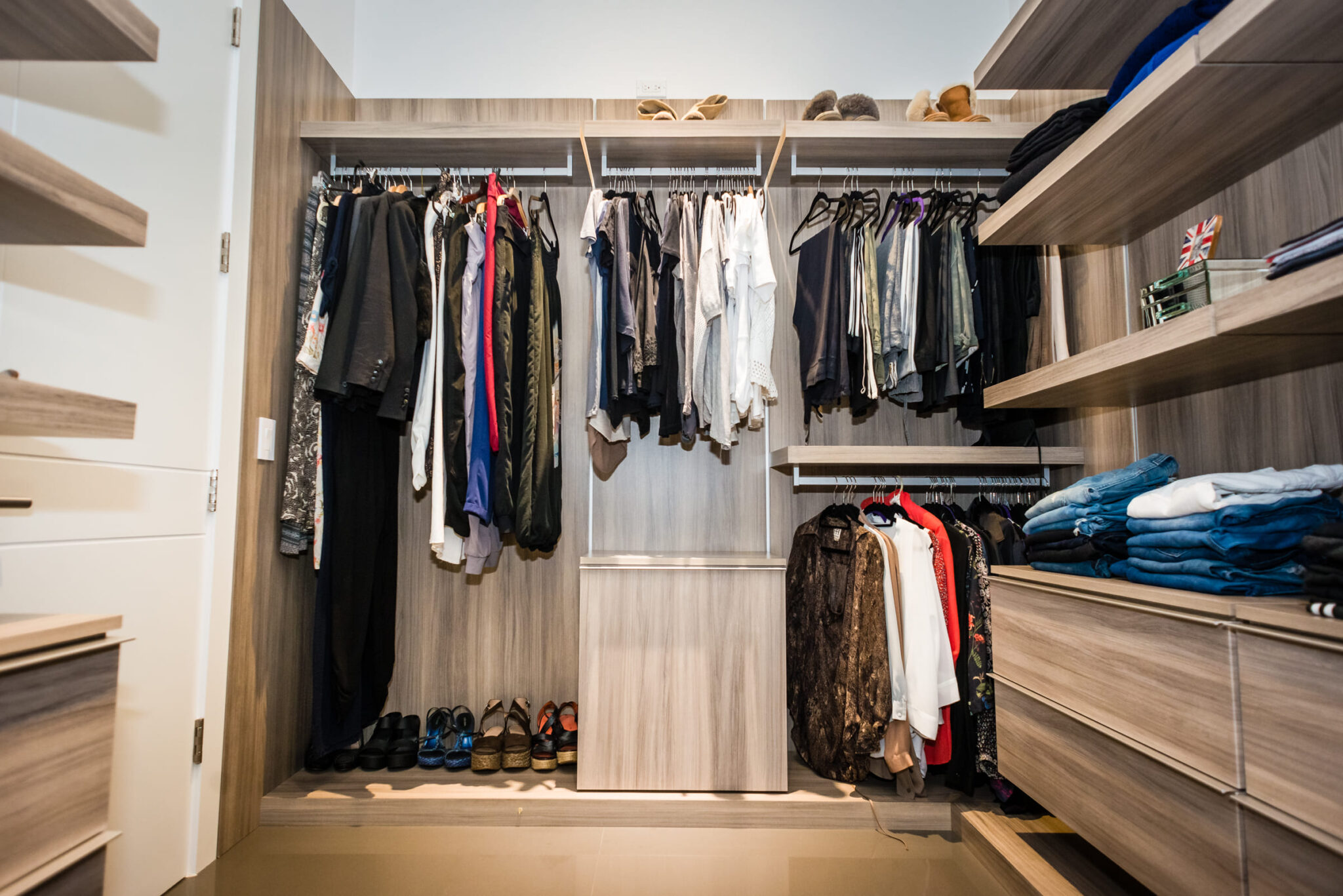 Light wood and white finish reach in closet design