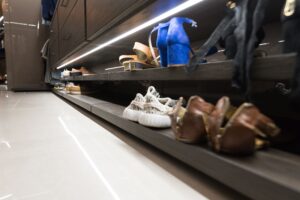 Shoe storage system with integrated lighting