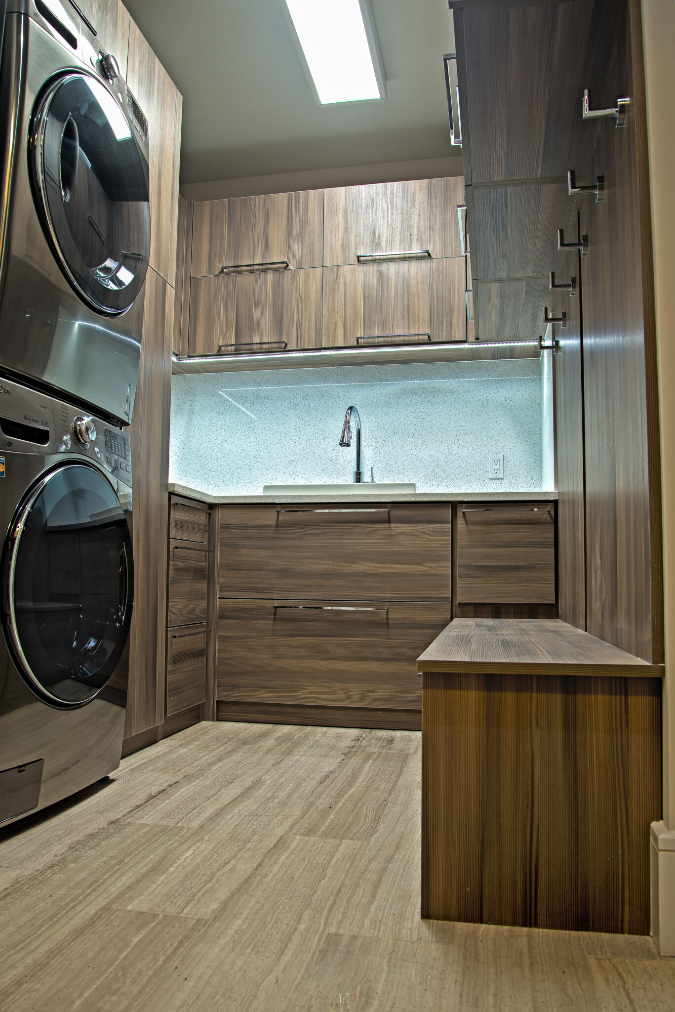 Modern pantry design with laundry organizing system