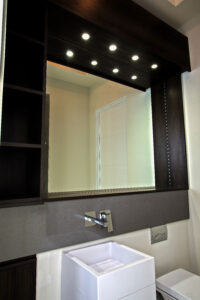 Shelving and mirroring system for bathroom