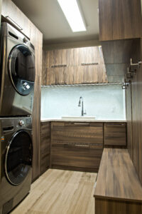 Modern pantry design with laundry organizing system
