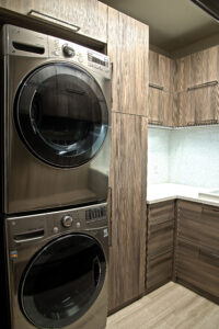 Modern pantry design with laundry organizing system