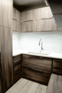 Modern pantry and cabinet system in oak wood finish