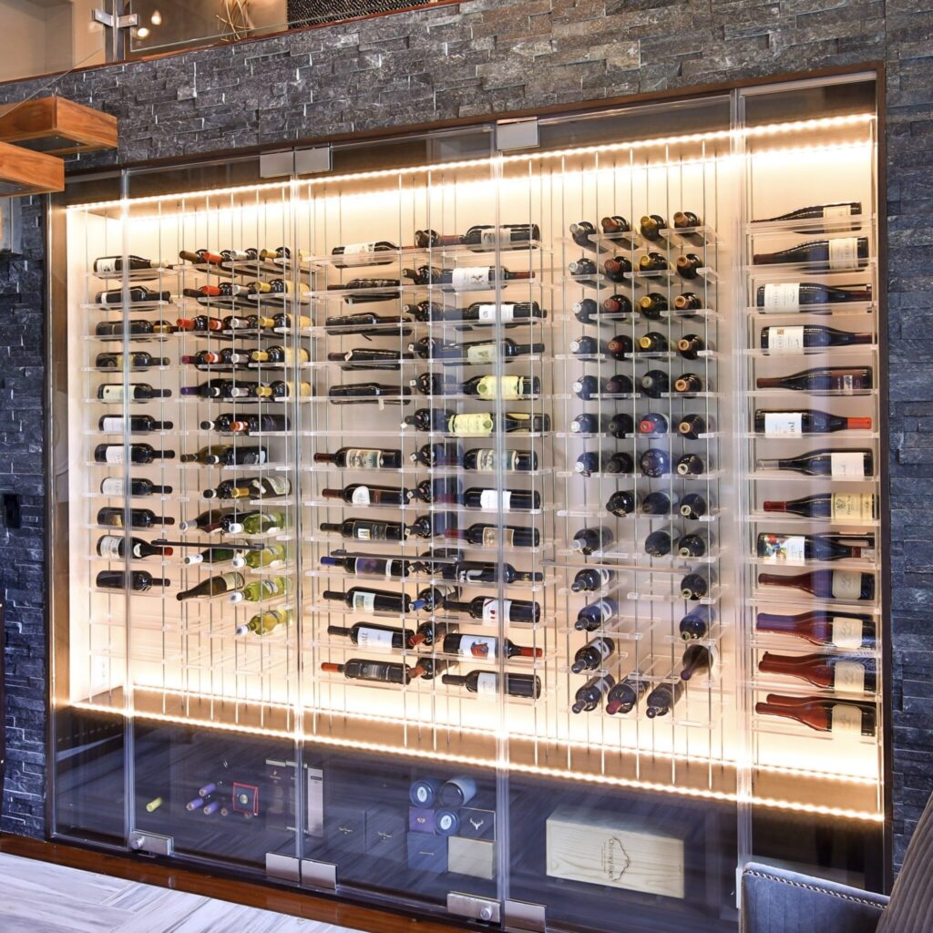 Custom luxury wine cellar with glass panels, showcasing an elegant design and premium storage for wine collections.