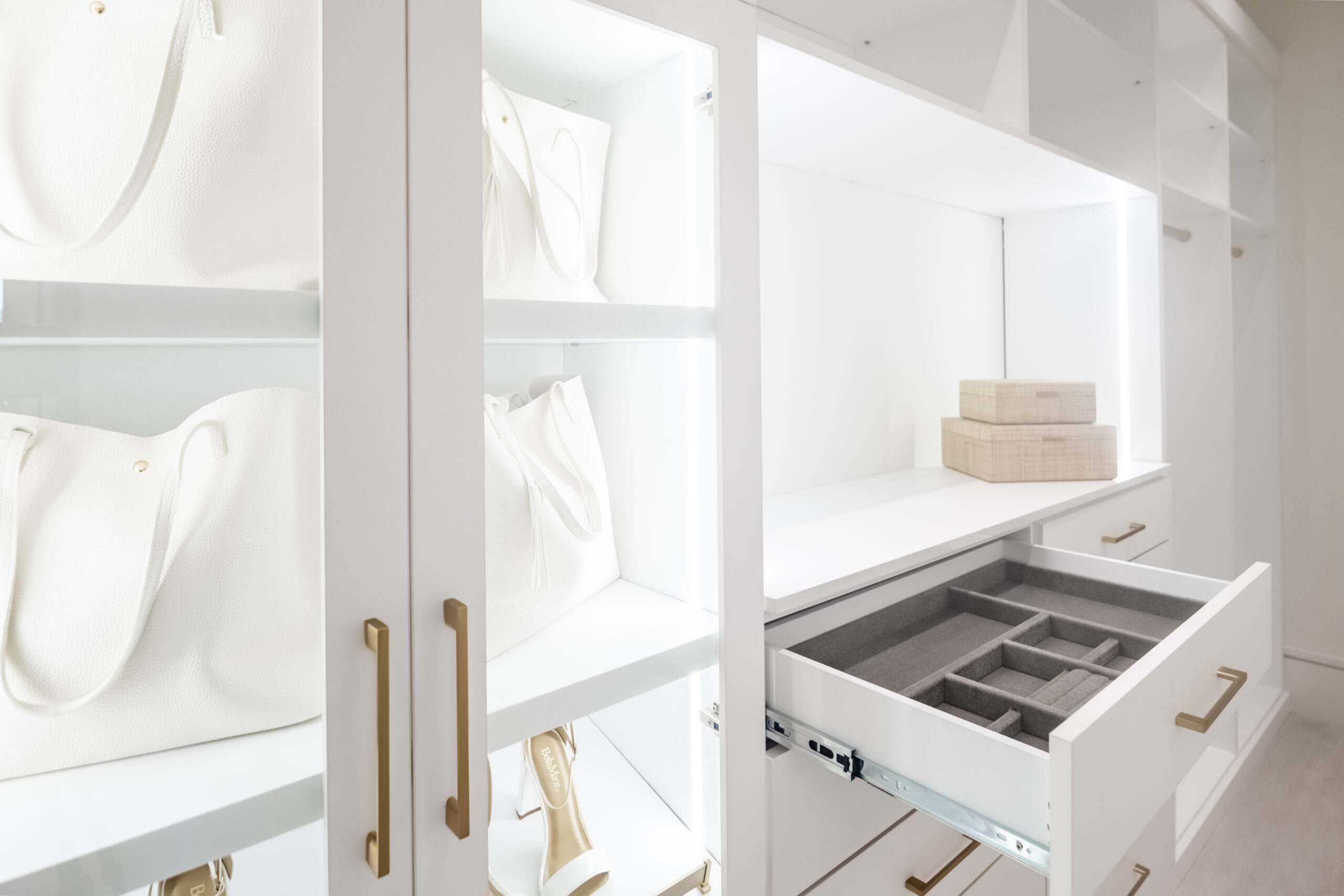 Custom closet drawers Boca Raton with white built-in organizers, part of JL Closets' custom closet systems Boca Raton and luxury closet accessories.