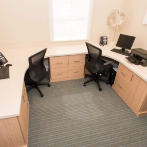 custom modern home office with light wood finish