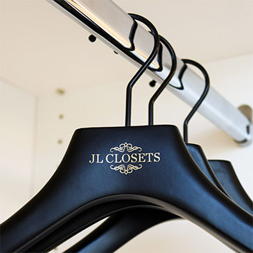 Custom Closet Accessories For Enhanced Organization, Featuring Hangers And Rails Designed By Jl Closets.