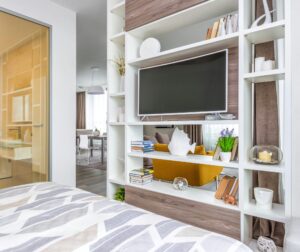 E12-white-bedroom-wall-unit-with-tv-and-custom-shelving-scaled